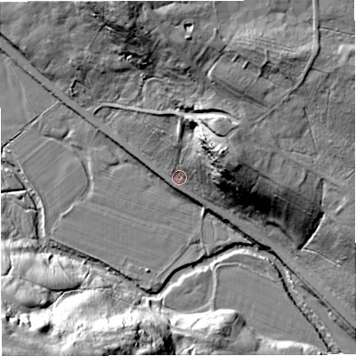 Shaded relief map of the ground around NE191TD, computed from Environment Agency LiDAR. The ground here sits at about 180 m above sea level and falls 50 m across the surrounding 800 m. Surface water reaching this point runs off ground lying to the east-north-east, 31.4 m higher.