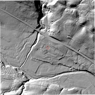 Shaded relief map of the ground around NE191TS, computed from Environment Agency LiDAR. The ground here sits at about 219 m above sea level and falls 82 m across the surrounding 800 m. Surface water reaching this point runs off ground lying to the north-east, 6.6 m higher.