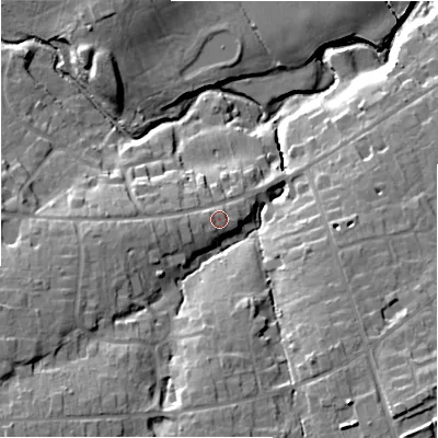 Shaded relief map of the ground around NE209HN, computed from Environment Agency LiDAR. The ground here sits at about 76 m above sea level and falls 23 m across the surrounding 800 m. Surface water reaching this point runs off ground lying to the west, 1.9 m higher.