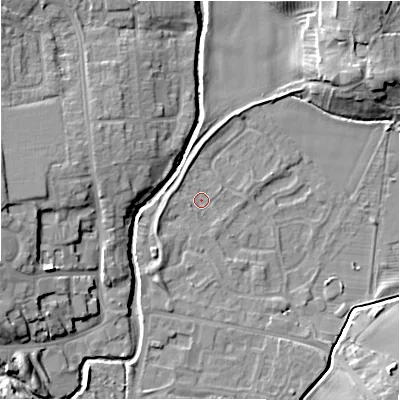 Shaded relief map of the ground around NE209XA, computed from Environment Agency LiDAR. The ground here sits at about 56 m above sea level and falls 12 m across the surrounding 800 m. Surface water reaching this point runs off ground lying to the south-south-west, 2.4 m higher.