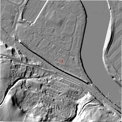 Shaded relief map of the ground around NE214FL, computed from Environment Agency LiDAR. The ground here sits at about 5 m above sea level and falls 53 m across the surrounding 800 m. Surface water reaching this point runs off ground lying to the south-south-west, 4.5 m higher.