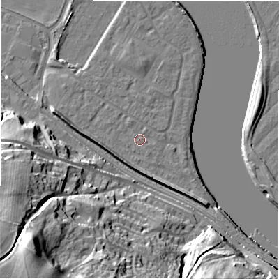 Shaded relief map of the ground around NE214FR, computed from Environment Agency LiDAR. The ground here sits at about 5 m above sea level and falls 53 m across the surrounding 800 m. Surface water reaching this point runs off ground lying to the east, 0.7 m higher.