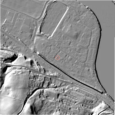 Shaded relief map of the ground around NE214FS, computed from Environment Agency LiDAR. The ground here sits at about 5 m above sea level and falls 52 m across the surrounding 800 m. Surface water reaching this point runs off ground lying to the west-south-west, 4.8 m higher.