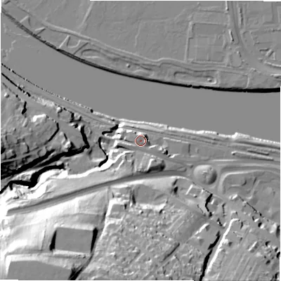 Shaded relief map of the ground around NE214JJ, computed from Environment Agency LiDAR. The ground here sits at about 10 m above sea level and falls 64 m across the surrounding 800 m. Surface water reaching this point runs off ground lying to the east-south-east, 1.5 m higher.