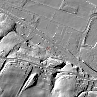 Shaded relief map of the ground around NE214TE, computed from Environment Agency LiDAR. The ground here sits at about 9 m above sea level and falls 65 m across the surrounding 800 m. Surface water reaching this point runs off ground lying to the south-west, 26.7 m higher.