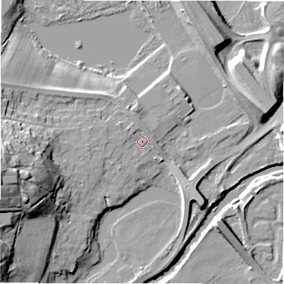 Shaded relief map of the ground around NE215NP, computed from Environment Agency LiDAR. The ground here sits at about 7 m above sea level and falls 26 m across the surrounding 800 m. Surface water reaching this point runs off ground lying to the north-west, 1.6 m higher.