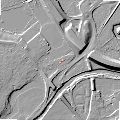 Shaded relief map of the ground around NE215PH, computed from Environment Agency LiDAR. The ground here sits at about 6 m above sea level and falls 15 m across the surrounding 800 m. Surface water reaching this point runs off ground lying to the east, 0.8 m higher.