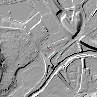 Shaded relief map of the ground around NE215TG, computed from Environment Agency LiDAR. The ground here sits at about 5 m above sea level and falls 15 m across the surrounding 800 m. Surface water reaching this point runs off ground lying to the south, 4.2 m higher.