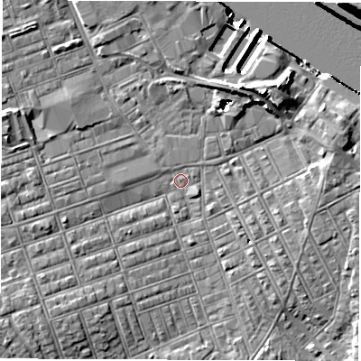 Shaded relief map of the ground around NE241AB, computed from Environment Agency LiDAR. The ground here sits at about 3 m above sea level and falls 15 m across the surrounding 800 m. Surface water reaching this point runs off ground lying to the north-east, 6.3 m higher.