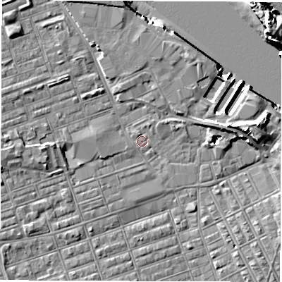 Shaded relief map of the ground around NE241AY, computed from Environment Agency LiDAR. The ground here sits at about 3 m above sea level and falls 16 m across the surrounding 800 m. Surface water reaching this point runs off ground lying to the west, 3.5 m higher.