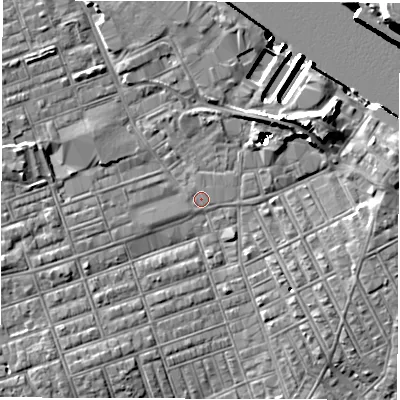 Shaded relief map of the ground around NE241BJ, computed from Environment Agency LiDAR. The ground here sits at about 3 m above sea level and falls 15 m across the surrounding 800 m. Surface water reaching this point runs off ground lying to the north-east, 8.0 m higher.