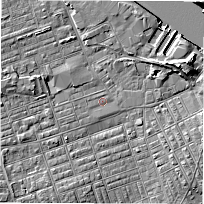 Shaded relief map of the ground around NE241BQ, computed from Environment Agency LiDAR. The ground here sits at about 4 m above sea level and falls 14 m across the surrounding 800 m. Surface water reaching this point runs off ground lying to the west-south-west, 2.2 m higher.