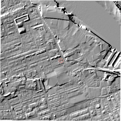 Shaded relief map of the ground around NE241LJ, computed from Environment Agency LiDAR. The ground here sits at about 4 m above sea level and falls 18 m across the surrounding 800 m. Surface water reaching this point runs off ground lying to the west-south-west, 4.4 m higher.