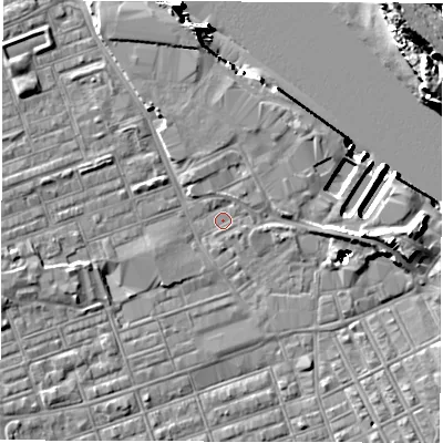 Shaded relief map of the ground around NE241LY, computed from Environment Agency LiDAR. The ground here sits at about 3 m above sea level and falls 18 m across the surrounding 800 m. Surface water reaching this point runs off ground lying to the west-south-west, 3.5 m higher.