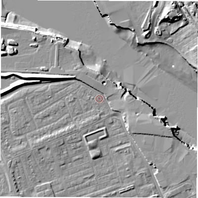 Shaded relief map of the ground around NE241PA, computed from Environment Agency LiDAR. The ground here sits at about 4 m above sea level and falls 13 m across the surrounding 800 m. Surface water reaching this point runs off ground lying to the west-north-west, 7.8 m higher.