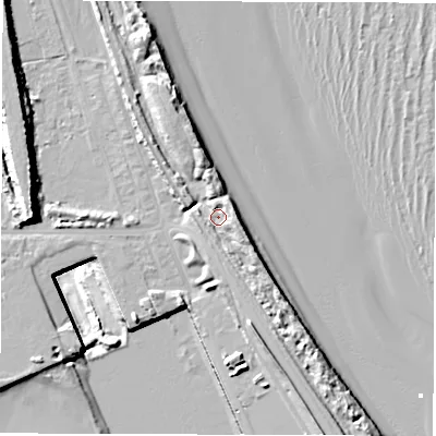 Shaded relief map of the ground around NE241QH, computed from Environment Agency LiDAR. The ground here sits at about 6 m above sea level and falls 25 m across the surrounding 800 m. Surface water reaching this point runs off ground lying to the south-east, 4.4 m higher.