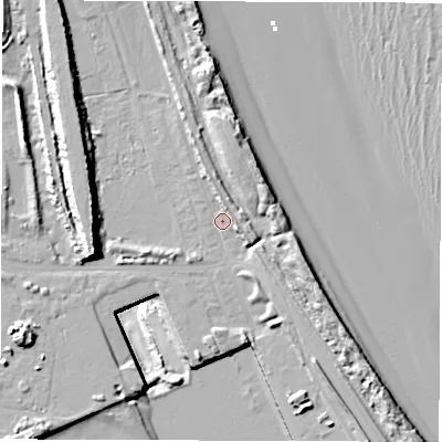 Shaded relief map of the ground around NE241QJ, computed from Environment Agency LiDAR. The ground here sits at about 5 m above sea level and falls 25 m across the surrounding 800 m. Surface water reaching this point runs off ground lying to the north-north-east, 3.4 m higher.