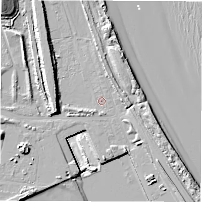 Shaded relief map of the ground around NE241QZ, computed from Environment Agency LiDAR. The ground here sits at about 4 m above sea level and falls 30 m across the surrounding 800 m. Surface water reaching this point runs off ground lying to the south-south-east, 1.4 m higher.