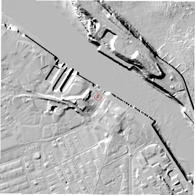 Shaded relief map of the ground around NE242AS, computed from Environment Agency LiDAR. The ground here sits at about 4 m above sea level and falls 19 m across the surrounding 800 m. Surface water reaching this point runs off ground lying to the west-south-west, 6.0 m higher.