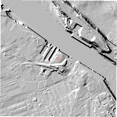 Shaded relief map of the ground around NE242AZ, computed from Environment Agency LiDAR. The ground here sits at about 5 m above sea level and falls 19 m across the surrounding 800 m. Surface water reaching this point runs off ground lying to the north-east, 0.7 m higher.