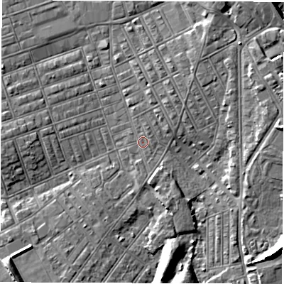 Shaded relief map of the ground around NE242ED, computed from Environment Agency LiDAR. The ground here sits at about 4 m above sea level and falls 11 m across the surrounding 800 m. Surface water reaching this point runs off ground lying to the north-north-east, 0.6 m higher.