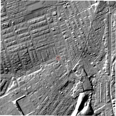 Shaded relief map of the ground around NE242FB, computed from Environment Agency LiDAR. The ground here sits at about 3 m above sea level and falls 6 m across the surrounding 800 m. Surface water reaching this point runs off ground lying to the south-south-east, 6.1 m higher.
