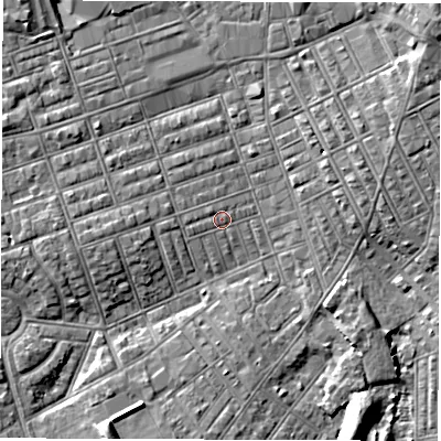 Shaded relief map of the ground around NE242HQ, computed from Environment Agency LiDAR. The ground here sits at about 4 m above sea level and falls 6 m across the surrounding 800 m. Surface water reaching this point runs off ground lying to the west, 1.0 m higher.