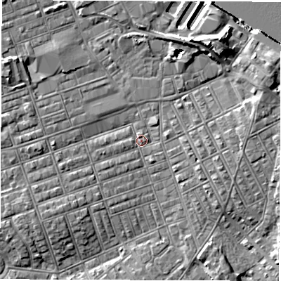 Shaded relief map of the ground around NE242JL, computed from Environment Agency LiDAR. The ground here sits at about 3 m above sea level and falls 14 m across the surrounding 800 m. Surface water reaching this point runs off ground lying to the south-west, 3.3 m higher.