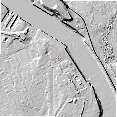 Shaded relief map of the ground around NE243AG, computed from Environment Agency LiDAR. The ground here sits at about 5 m above sea level and falls 19 m across the surrounding 800 m. Surface water reaching this point runs off ground lying to the south-west, 2.0 m higher.