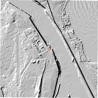 Shaded relief map of the ground around NE243BS, computed from Environment Agency LiDAR. The ground here sits at about 4 m above sea level and falls 12 m across the surrounding 800 m. Surface water reaching this point runs off ground lying to the west-south-west, 4.2 m higher.