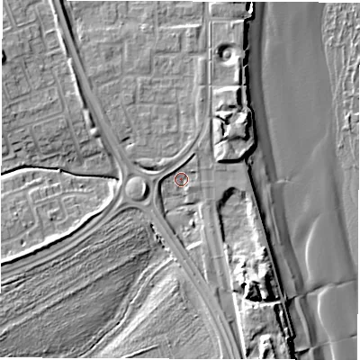 Shaded relief map of the ground around NE243FE, computed from Environment Agency LiDAR. The ground here sits at about 5 m above sea level and falls 16 m across the surrounding 800 m. Surface water reaching this point runs off ground lying to the south-south-east, 9.6 m higher.