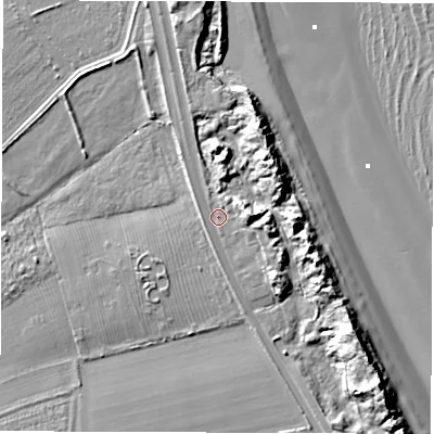 Shaded relief map of the ground around NE243PH, computed from Environment Agency LiDAR. The ground here sits at about 7 m above sea level and falls 18 m across the surrounding 800 m. Surface water reaching this point runs off ground lying to the east, 8.1 m higher.