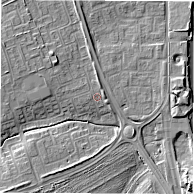 Shaded relief map of the ground around NE243PT, computed from Environment Agency LiDAR. The ground here sits at about 6 m above sea level and falls 11 m across the surrounding 800 m. Surface water reaching this point runs off ground lying to the west, 1.0 m higher.
