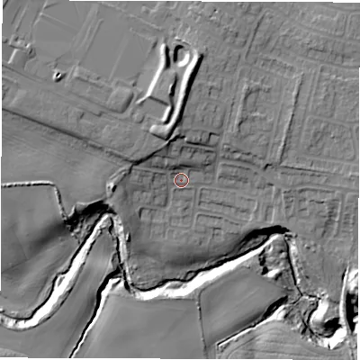Shaded relief map of the ground around NE250JP, computed from Environment Agency LiDAR. The ground here sits at about 33 m above sea level and falls 22 m across the surrounding 800 m. Surface water reaching this point runs off ground lying to the north, 8.0 m higher.