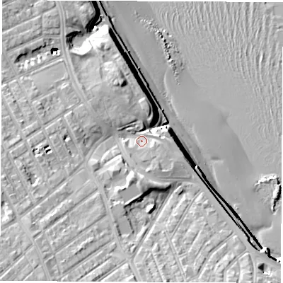 Shaded relief map of the ground around NE261BG, computed from Environment Agency LiDAR. The ground here sits at about 11 m above sea level and falls 26 m across the surrounding 800 m. Surface water reaching this point runs off ground lying to the south-south-east, 2.6 m higher.