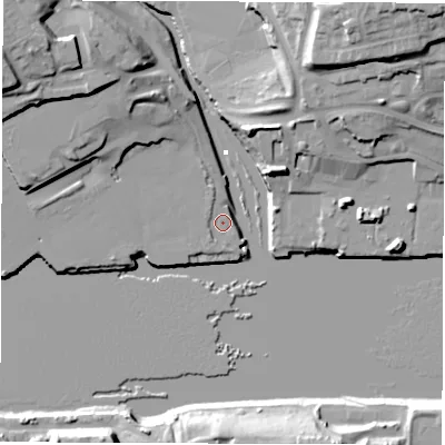 Shaded relief map of the ground around NE286QT, computed from Environment Agency LiDAR. The ground here sits at about 3 m above sea level and falls 25 m across the surrounding 800 m. Surface water reaching this point runs off ground lying to the south-south-east, 15.9 m higher.