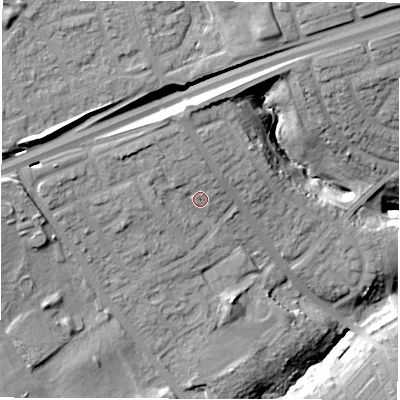 Shaded relief map of the ground around NE288DY, computed from Environment Agency LiDAR. The ground here sits at about 33 m above sea level and falls 25 m across the surrounding 800 m. Surface water reaching this point runs off ground lying to the north, 4.6 m higher.