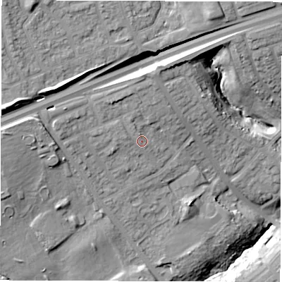Shaded relief map of the ground around NE288DZ, computed from Environment Agency LiDAR. The ground here sits at about 33 m above sea level and falls 23 m across the surrounding 800 m. Surface water reaching this point runs off ground lying to the west-north-west, 12.2 m higher.