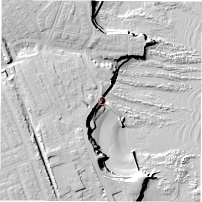 Shaded relief map of the ground around NE304QB, computed from Environment Agency LiDAR. The ground here sits at about 14 m above sea level and falls 29 m across the surrounding 800 m. Surface water reaching this point runs off ground lying to the south-west, 10.3 m higher.