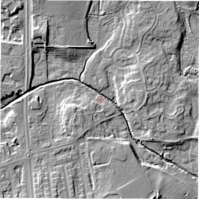 Shaded relief map of the ground around NE32DJ, computed from Environment Agency LiDAR. The ground here sits at about 48 m above sea level and falls 11 m across the surrounding 800 m. Surface water reaching this point runs off ground lying to the north-west, 10.3 m higher.