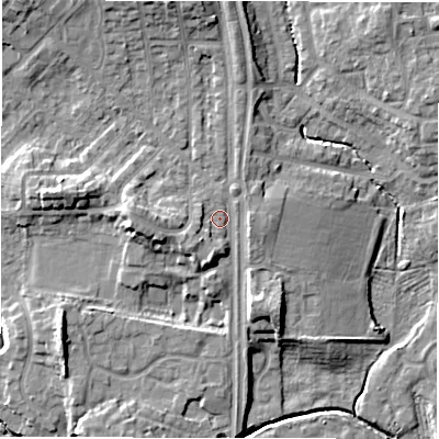 Shaded relief map of the ground around NE32EB, computed from Environment Agency LiDAR. The ground here sits at about 52 m above sea level and falls 11 m across the surrounding 800 m. Surface water reaching this point runs off ground lying to the north, 4.4 m higher.