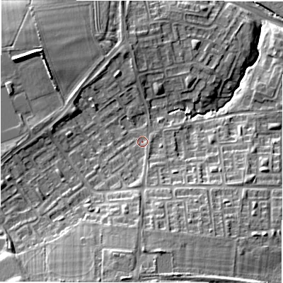 Shaded relief map of the ground around NE32UE, computed from Environment Agency LiDAR. The ground here sits at about 60 m above sea level and falls 18 m across the surrounding 800 m. Surface water reaching this point runs off ground lying to the south, 7.4 m higher.