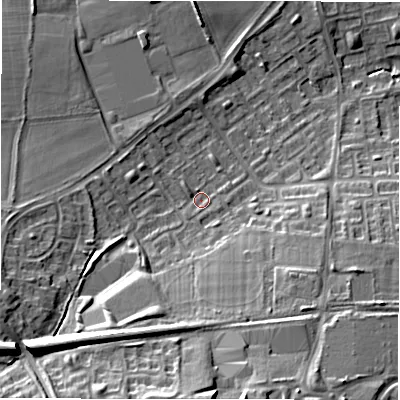 Shaded relief map of the ground around NE32UZ, computed from Environment Agency LiDAR. The ground here sits at about 63 m above sea level and falls 20 m across the surrounding 800 m. Surface water reaching this point runs off ground lying to the south-west, 14.4 m higher.
