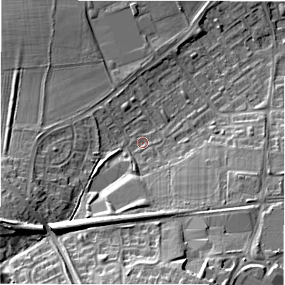 Shaded relief map of the ground around NE32XA, computed from Environment Agency LiDAR. The ground here sits at about 64 m above sea level and falls 22 m across the surrounding 800 m. Surface water reaching this point runs off ground lying to the south, 6.8 m higher.
