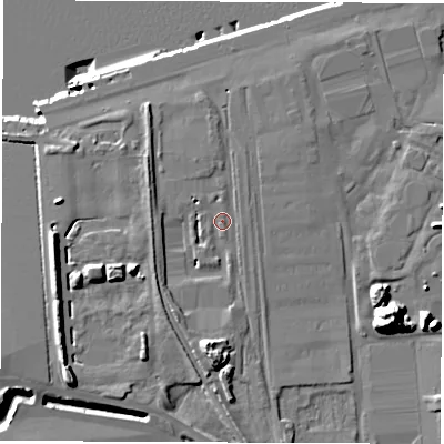 Shaded relief map of the ground around NE349PL, computed from Environment Agency LiDAR. The ground here sits at about 5 m above sea level and falls 20 m across the surrounding 800 m. Surface water reaching this point runs off ground lying to the south, 6.6 m higher.