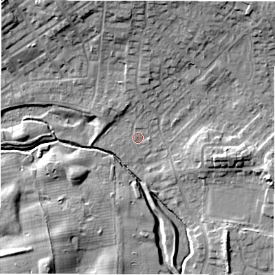 Shaded relief map of the ground around NE35AT, computed from Environment Agency LiDAR. The ground here sits at about 50 m above sea level and falls 13 m across the surrounding 800 m. Surface water reaching this point runs off ground lying to the north, 9.9 m higher.