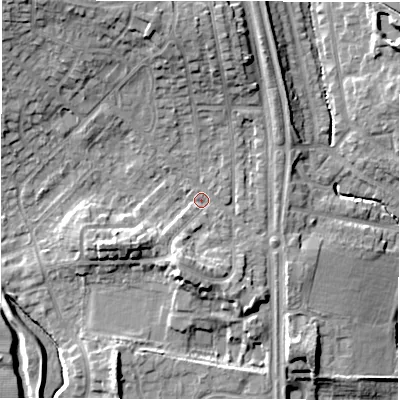 Shaded relief map of the ground around NE35NH, computed from Environment Agency LiDAR. The ground here sits at about 52 m above sea level and falls 13 m across the surrounding 800 m. Surface water reaching this point runs off ground lying to the north, 6.5 m higher.