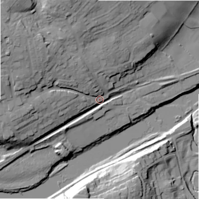 Shaded relief map of the ground around NE418DL, computed from Environment Agency LiDAR. The ground here sits at about 16 m above sea level and falls 38 m across the surrounding 800 m. Surface water reaching this point runs off ground lying to the north-west, 22.6 m higher.