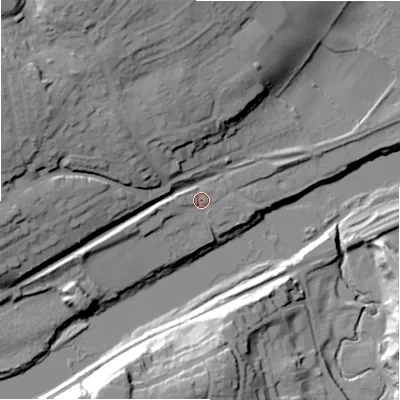 Shaded relief map of the ground around NE418DS, computed from Environment Agency LiDAR. The ground here sits at about 12 m above sea level and falls 35 m across the surrounding 800 m. Surface water reaching this point runs off ground lying to the west-south-west, 4.4 m higher.
