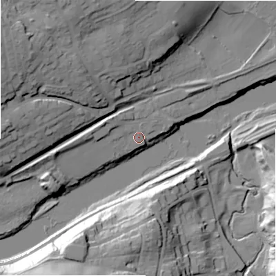 Shaded relief map of the ground around NE418DU, computed from Environment Agency LiDAR. The ground here sits at about 11 m above sea level and falls 43 m across the surrounding 800 m. Surface water reaching this point runs off ground lying to the west-north-west, 7.2 m higher.